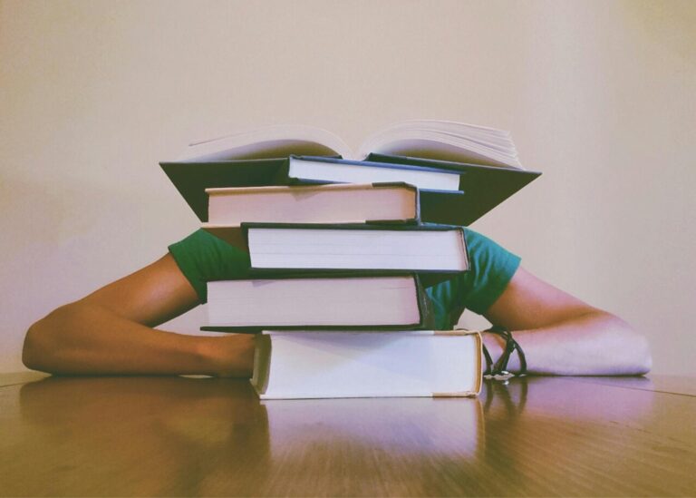 Is the GRE Harder Than College Exams? Comparing content, time pressure, and scoring